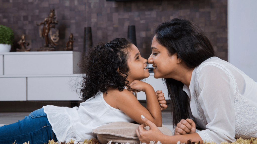 mother and daughter hanging out and rubbing noses