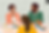 black parents and girl with rainbow flag at the table